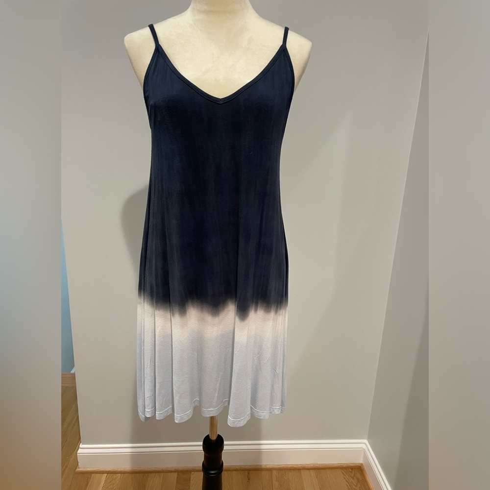 Spaghetti strap low back summer dress.